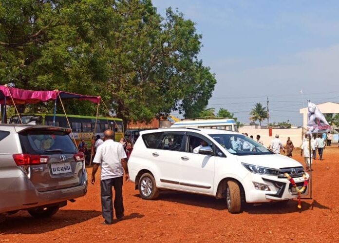 A candidate who brought a car with a flag near the polling booth, what happened next?