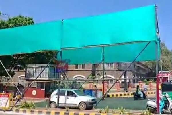 ಬಿಸಿಲ ಬೇಗೆಗೆ ಹೈರಾಣಾದ ಬೆಳಗಾವಿ ವಾಹನ ಸವಾರರು: ಟ್ರಾಫಿಕ್ ಸಿಗ್ನಲ್ ಗಳಿಗೆ ನೆರಳು ಛಾವಣಿ ಅಳವಡಿಕೆ!